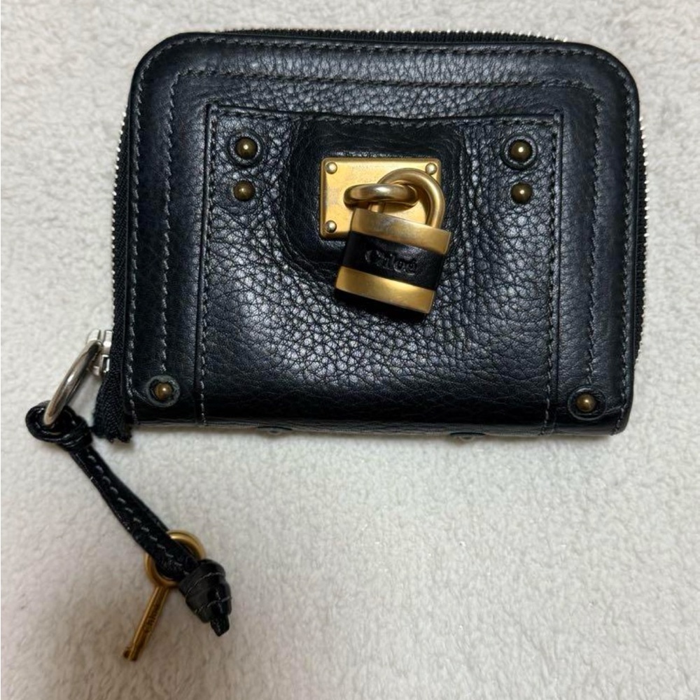 black Chloé paddington wallet gold hardware.